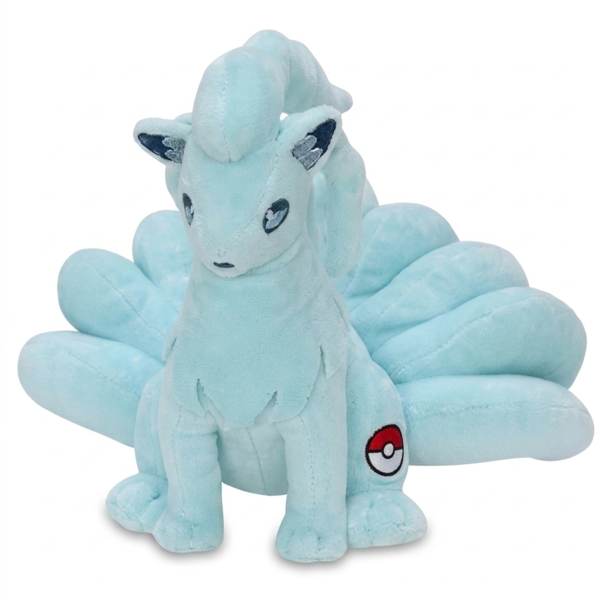 Ninetales Knuffel met badge die de echtheid bewijst.