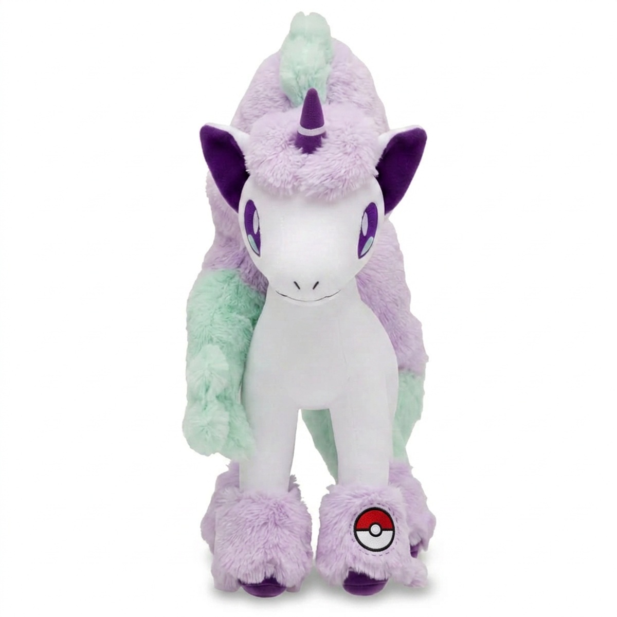 Ponyta Knuffel met badge die de echtheid bewijst.