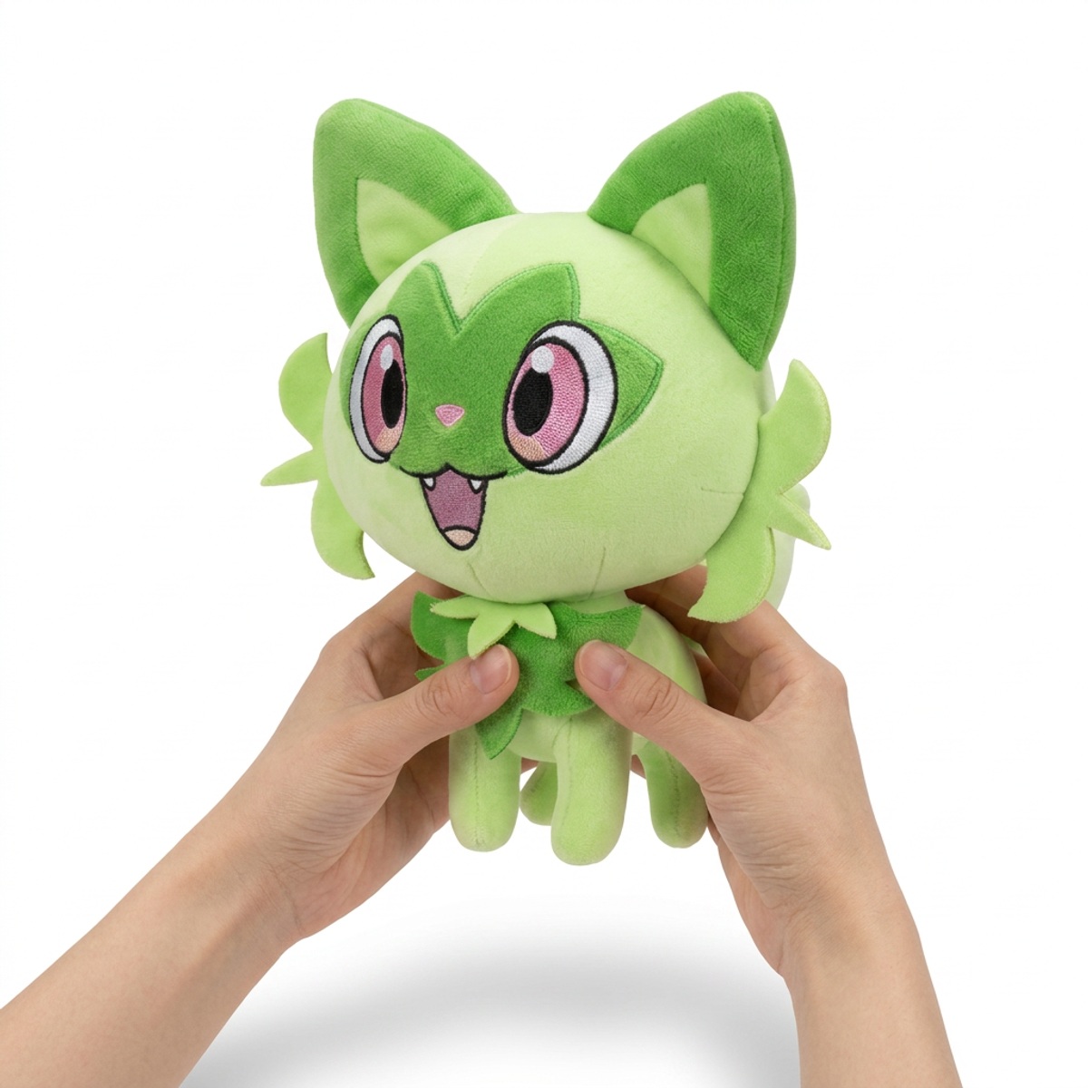 Sprigatito Knuffel in handen