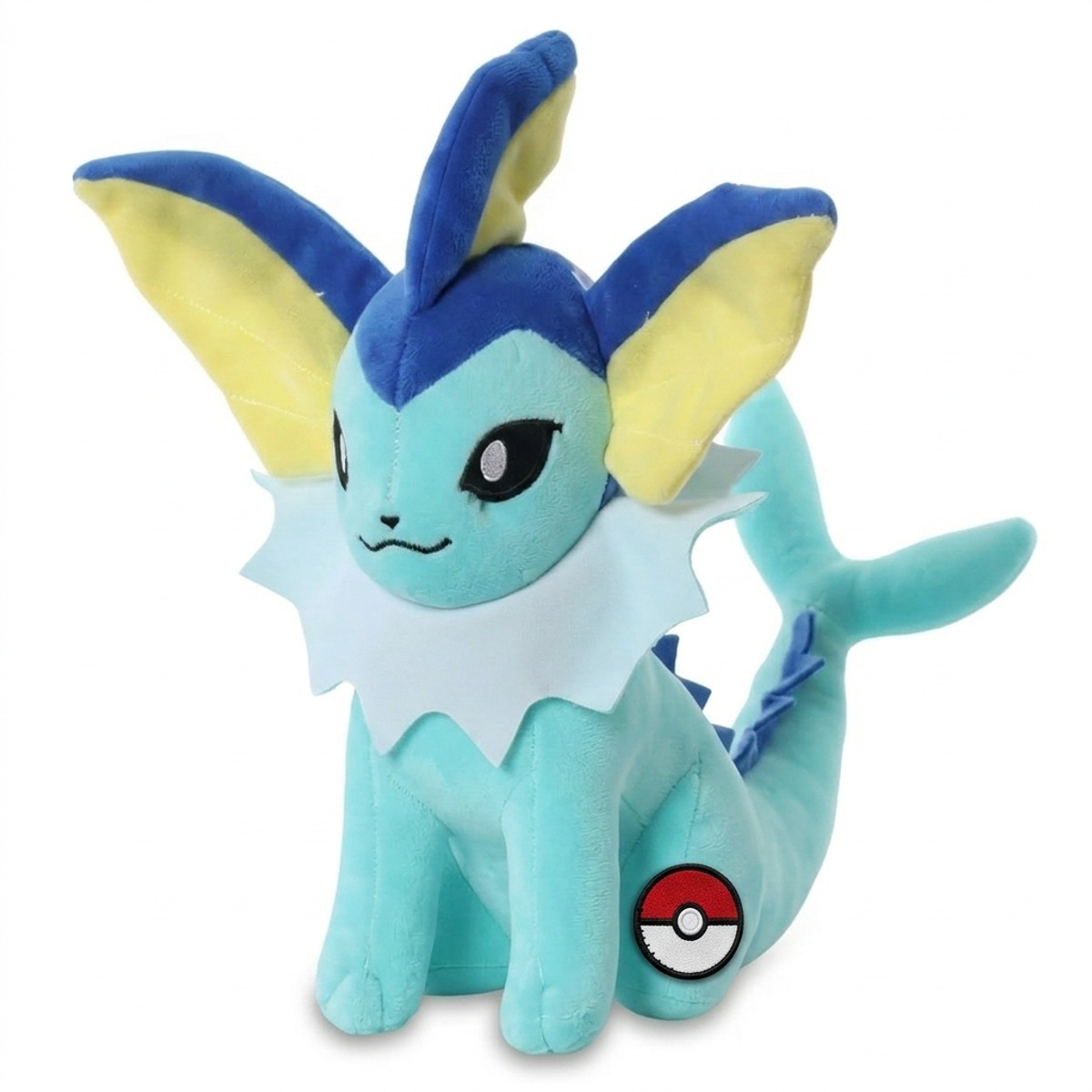 Vaporeon Knuffel met badge die de echtheid bewijst.