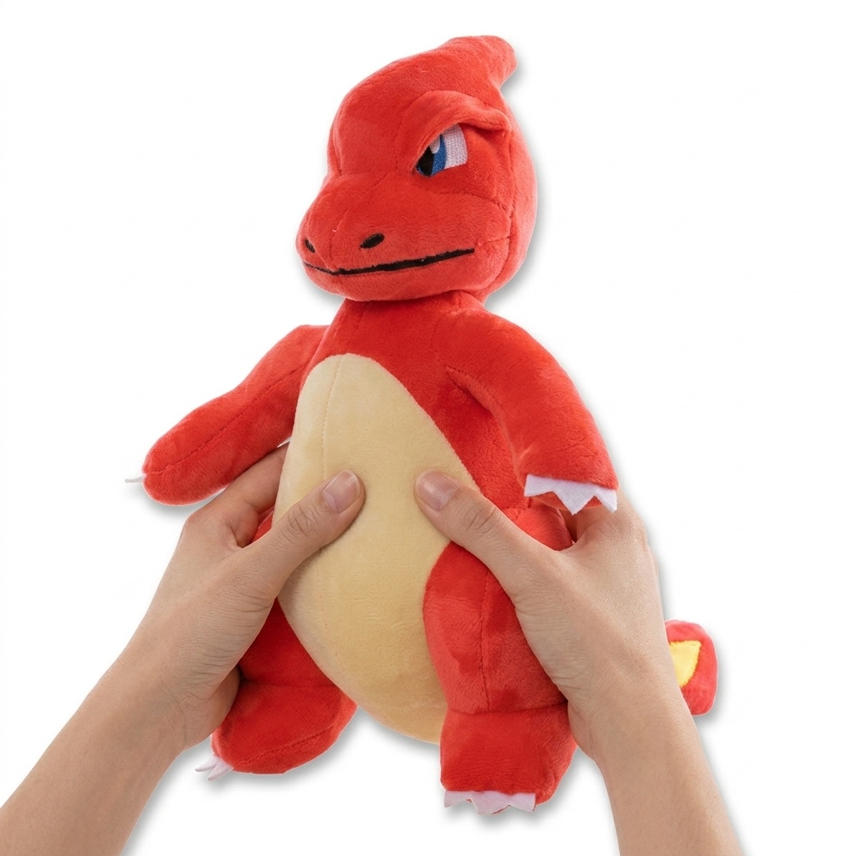 Charmeleon Knuffel in handen