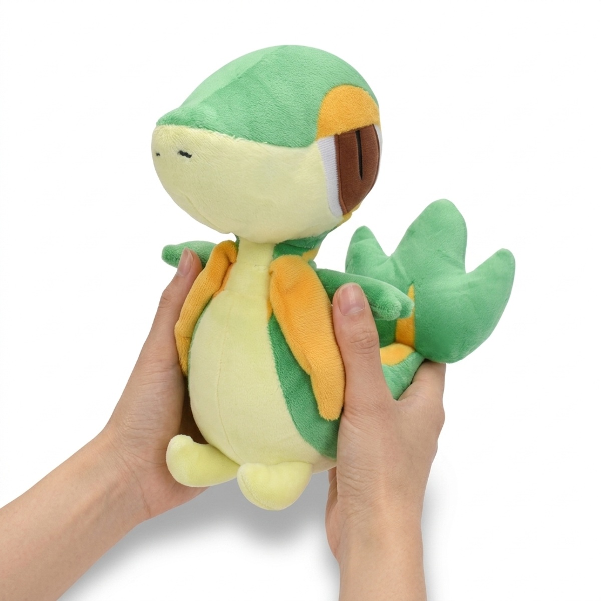 Snivy Knuffel vastgehouden in handen