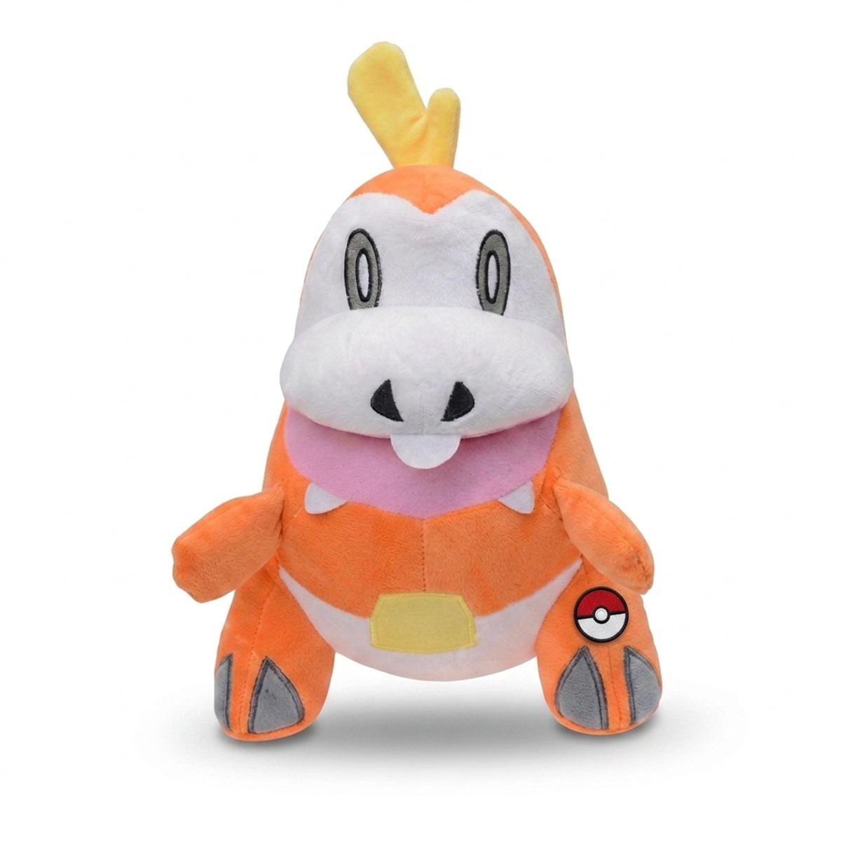 Fuecoco Knuffel met badge die de echtheid bewijst.