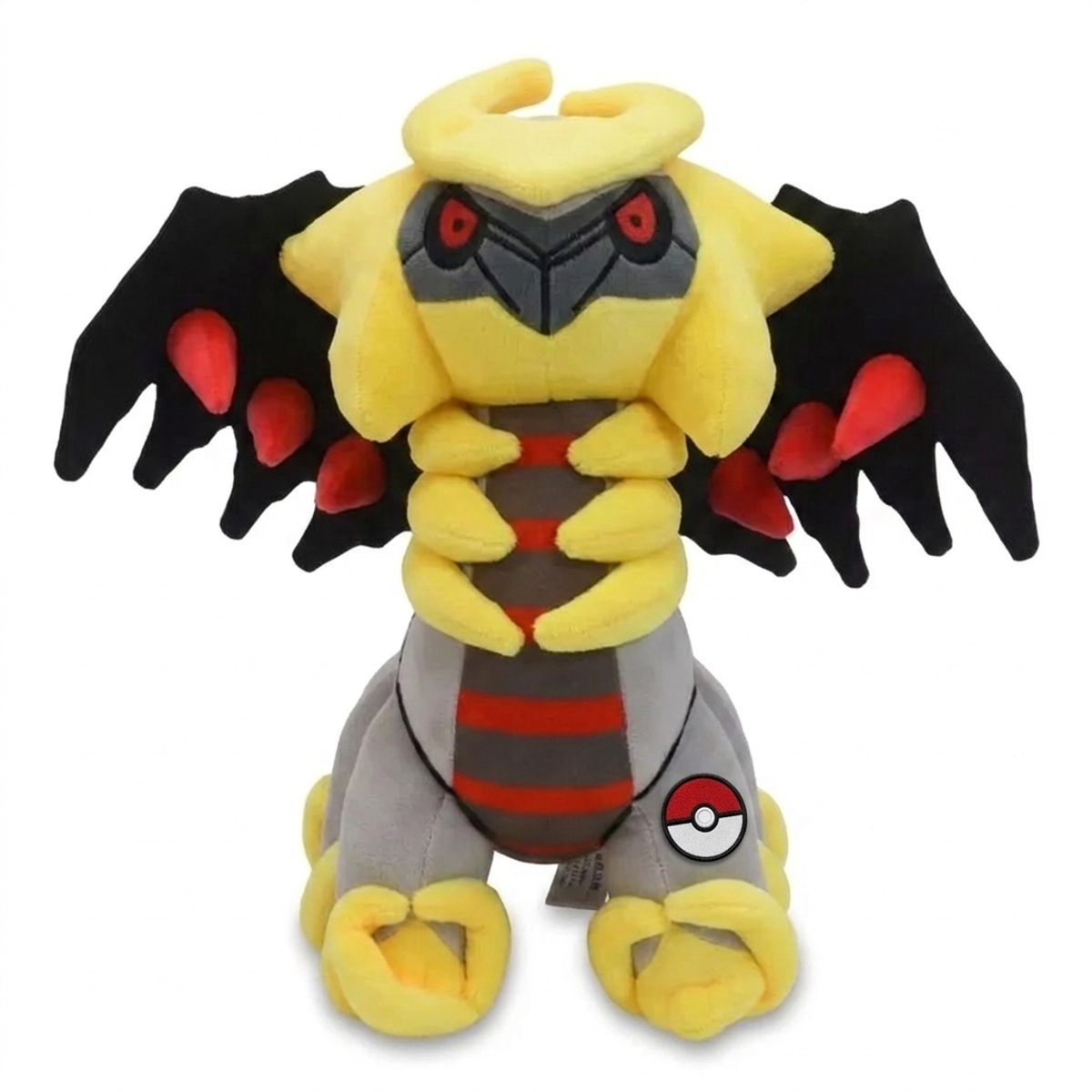 Giratina Knuffel met badge die de echtheid bewijst.