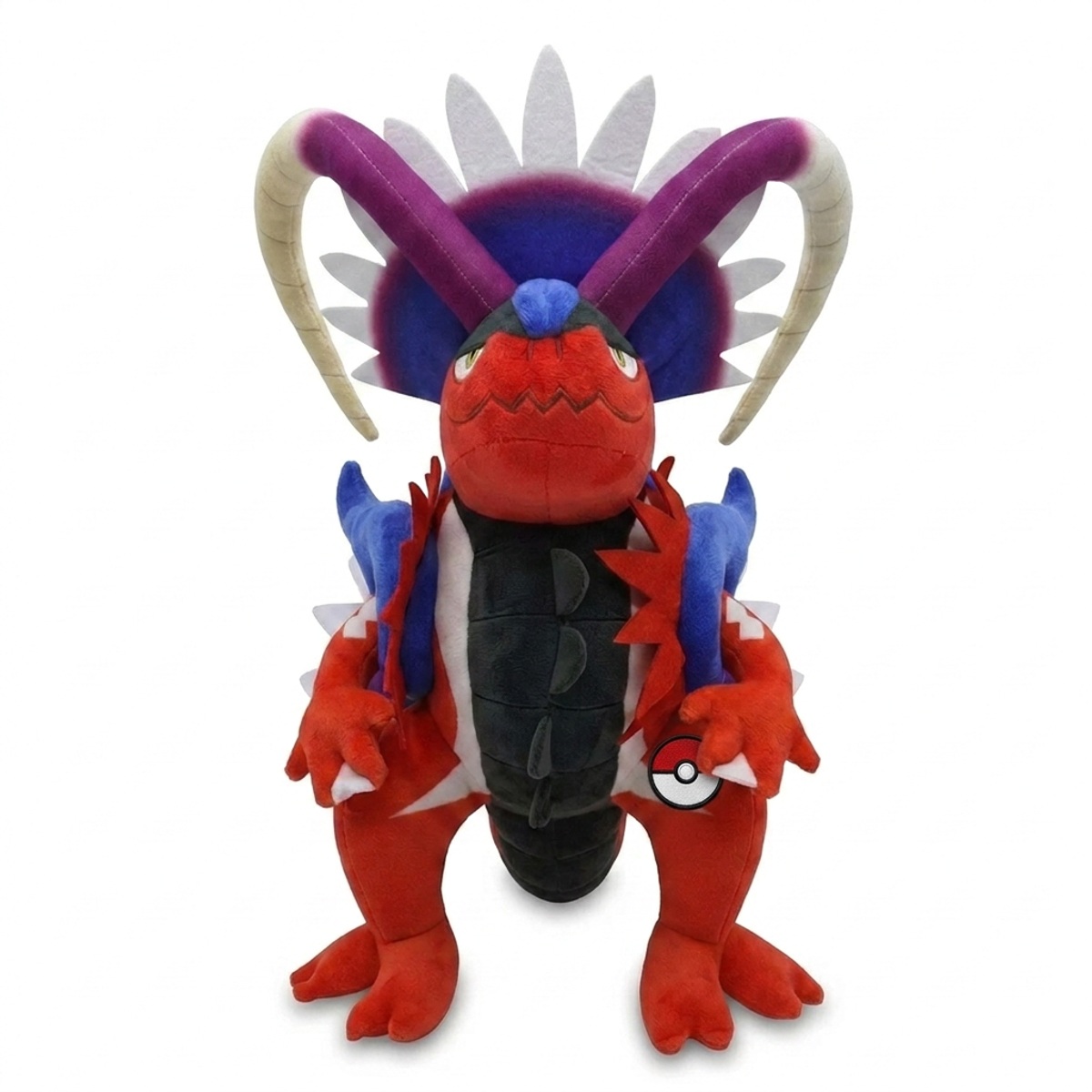 Koraidon Knuffel met badge die de echtheid bewijst.