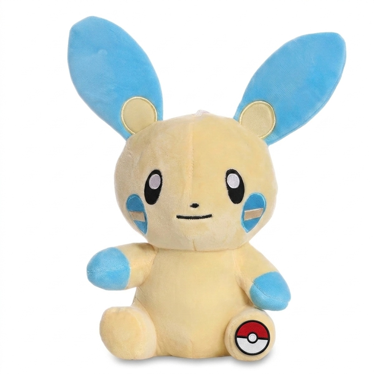 Minun Knuffel met badge die de echtheid bewijst.