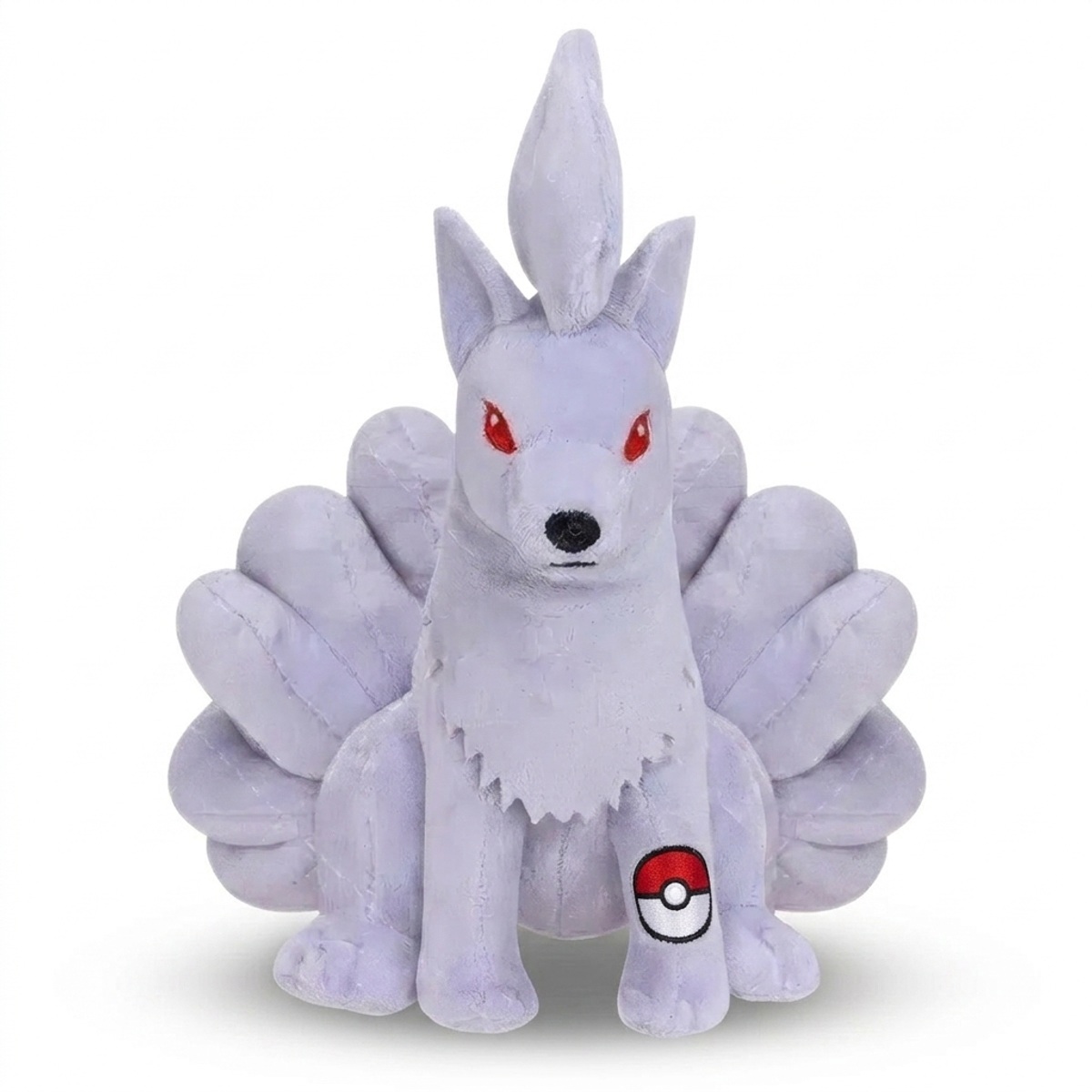 Ninetales Knuffel met badge die de echtheid bewijst.