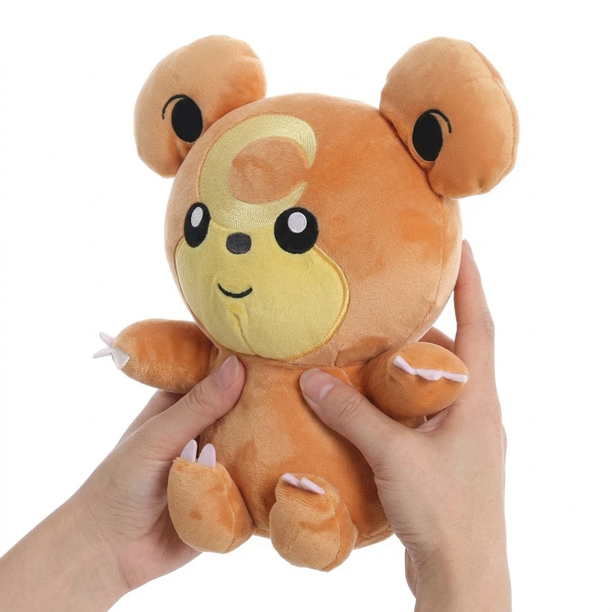 Teddiursa Knuffel vastgehouden in handen