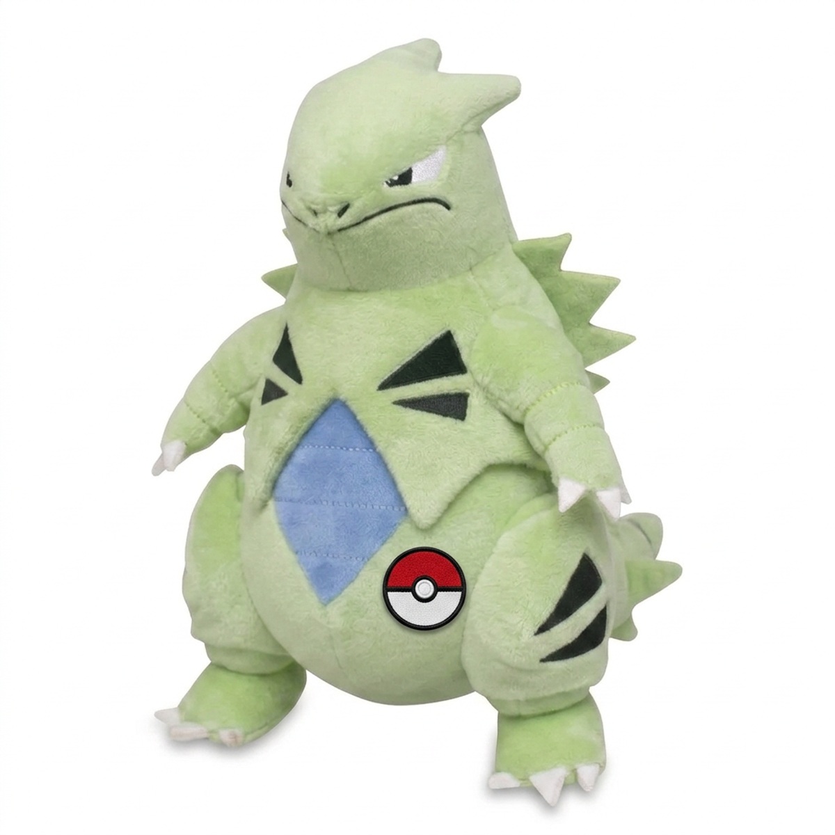 Tyranitar Knuffel met badge die de echtheid bewijst.